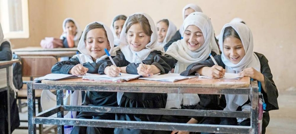 Young girls study at a school in Mazar-i-Sharīf, Balkh Province, Afghanistan. — courtesy UNICEF/Mark Naftalin