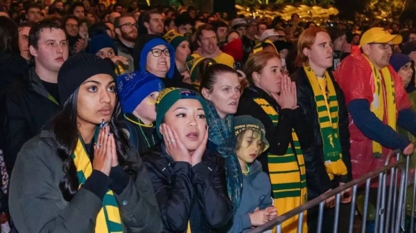 Fans hold their breath during the Australia v France penalty shootout on Saturday