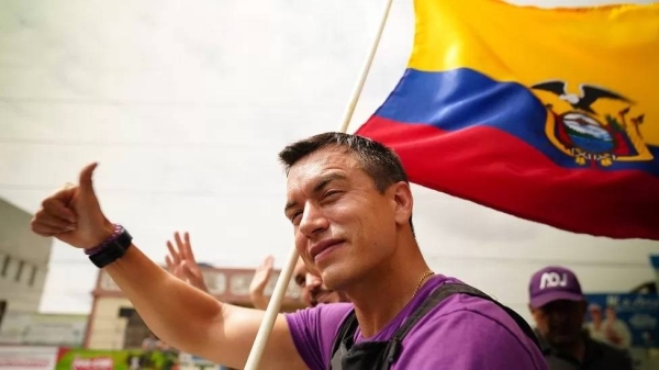 Presidential candidate Daniel Noboa appears at a campaign event wearing a bullet-proof vest