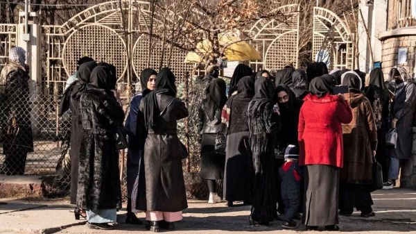 Afghan students outside Kabul University. The Taliban impose many restrictions on women and girls which make it difficult, if not impossible, for them to learn and earn