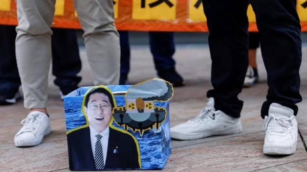 A box with a photo of Japan PM Kishida is seen during a protest in Hong Kong against the release of treated water from Fukushima