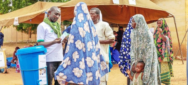 Cash distribution is one form of aid being carried out by WFP to help displaced people in Balléyara, Niger. — courtesy WFP Niger