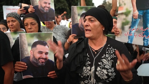 Israelis participate in a protest in Haifa, Israel, against the crime wave impacting their community, on August 31.