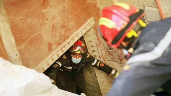 Emergency workers search a destroyed house in Amizmiz, Morocco. — courtesy Reuters
