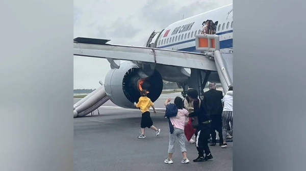 Videos shared on on social media showed passengers evacuating the Air China aircraft using the emergency exit slide.