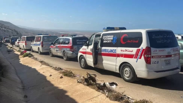Victims were taken in ambulances for burial at a cemetery in Derna