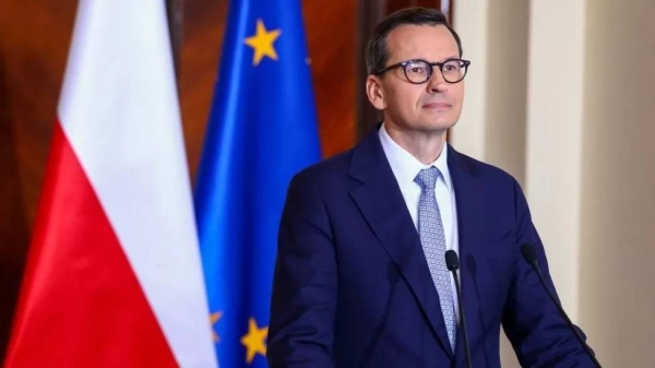 Polish Prime Minister Mateusz Morawiecki addressing a press conference.