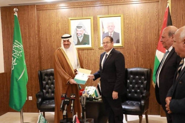 Saudi Ambassador to Palestine Naif Al-Sudairi presenting credentials to Majdi Al-Khalidi, advisor of the Palestine President for diplomatic affairs, in Amman last month. (File photo)
