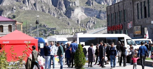 Refugees arrive in the border town of Goris in Armenia. — courtesy UNHCR/Karen Minasyan