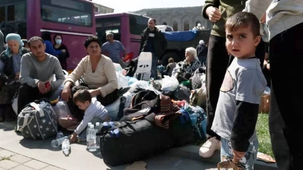 Armenian refugees wait in a square of Goris city center on Friday. — courtesy AFP via Getty Images