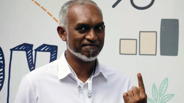 Mohamed Muizzu posed for cameras after casting his vote at a polling station in Male. — courtesy Reuters