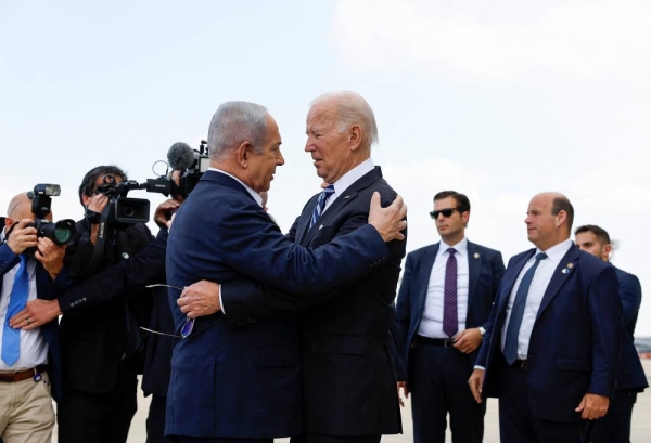 U.S. President Joe Biden is welcomed by Israeli Prime Minster Benjamin Netanyahu, as he visits Israel amid the ongoing conflict between Israel and Hamas, in Tel Aviv, Israel, October 18, 2023. REUTERS/Evelyn Hockstein 