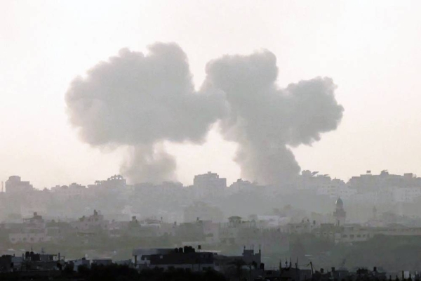 The view from Israel’s southern city of Sderot shows smoke billowing during a Israeli strike on Gaza on Sunday. — courtesy Getty Images