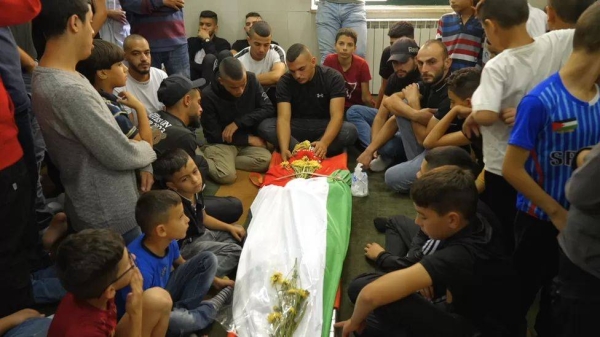 Palestinians at the funeral of Mahmoud Seif who was killed by the Israeli army in the West Bank