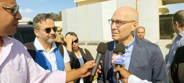 The UN human rights chief, Volker Türk, talks to the media at the Rafah crossing point into Gaza. — courtesy OHCHR