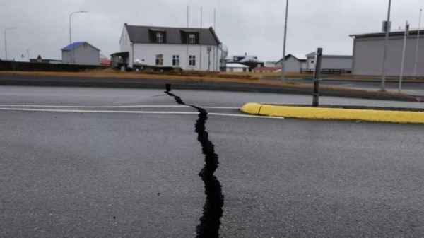 Cracks emerge on a road due to volcanic activity near a police station, in Grindavik, Iceland on 11 November
