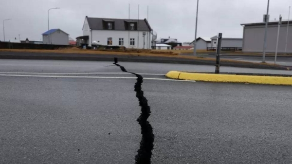 Cracks emerge on a road due to volcanic activity near a police station, in Grindavik, Iceland on 11 November