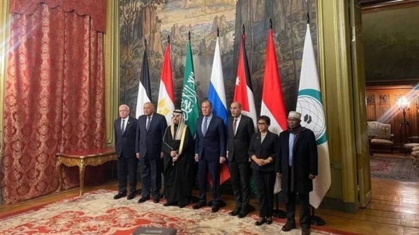 Russian Foreign Minister Sergey Lavrov is flanked by Saudi Foreign Minister Prince Faisal bin Farhan and members of the Islamic Ministerial Committee delegation, in Moscow on Tuesday.

