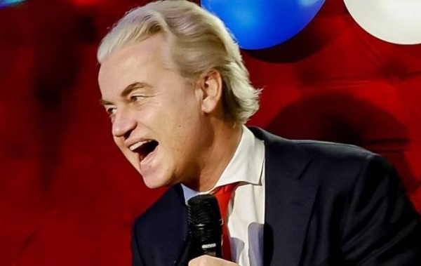 Dutch anti-Islam politician Geert Wilders celebrates exit poll lead