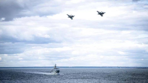 In this photo provided by the Swedish Armed Forces on Tuesday, Aug. 25, 2020, troops patrol by both air and sea in the Baltic Sea region