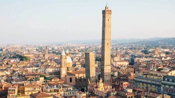 The skyline of Bologna is seen dominated by the Garisenda and Asinelli towers. courtesy Getty Images