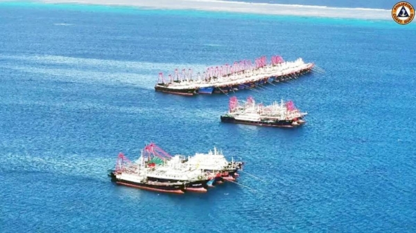 Dozens of Chinese militia boats in the South China Sea. — courtesy Reuters via Philippine Coast Guard