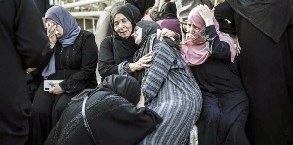 Palestinian women mourning the loss of a family member at Al-Nasser Medical Hospital in Khan Younis, southern the Gaza Strip. — curtesy UNICEF/UNI472270/Zaqout