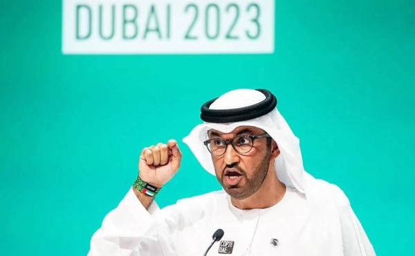 Dr. Sultan Ahmed Al Jaber, president-designate of COP28 and UAE’s minister for Industry and Advanced Technology, gestures at a press conference, with ‘Dubai 2023’ written on the screen behind. — courtesy EPA