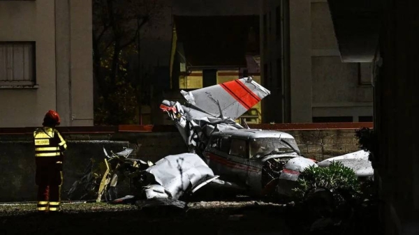 The plane began its emergency landing on a road before crashing against the wall of an apartment building