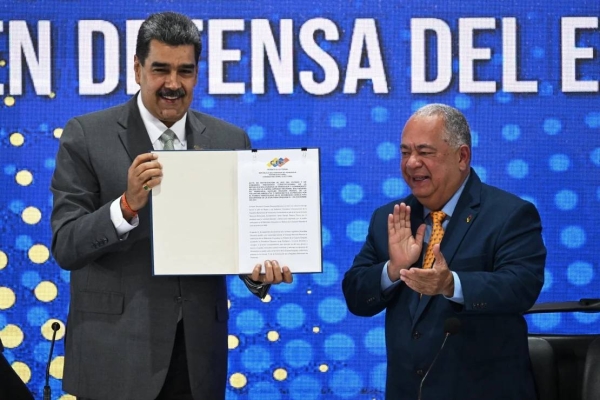 Maduro gives a press conference a day after the referendum, on December 4
