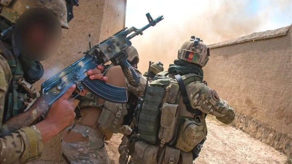 Soldiers in the CF333 unit, pictured training with British troops, are now in hiding in Pakistan