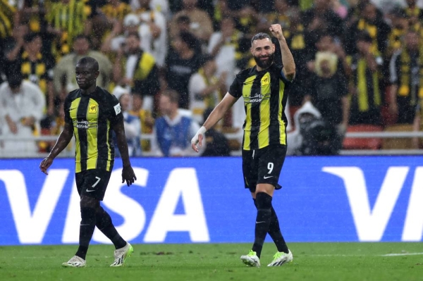 Karim Benzema celebrates his goal with N'Golo Kanté.