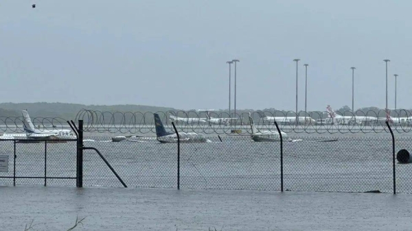 Floods have inundated many places in far north Queensland, including Cairns Airport