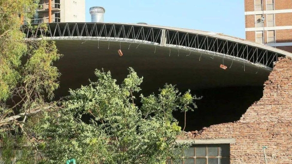Thirteen people were killed after the storm caused the partial collapse of a sports centre's roof in the port city of Bahia Blanca