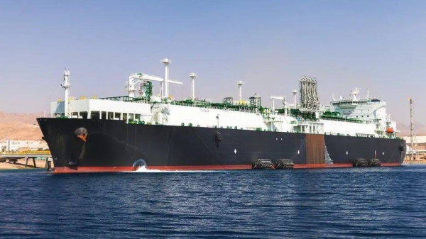A huge oil tanker is being loaded in a Jordanian port
