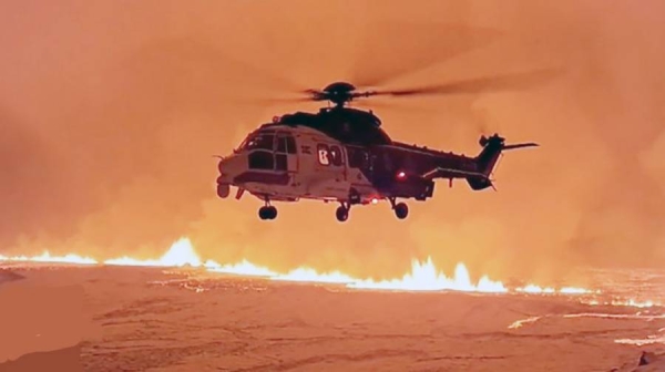 Spectacular helicopter shots show the eruption on the island’s coast.