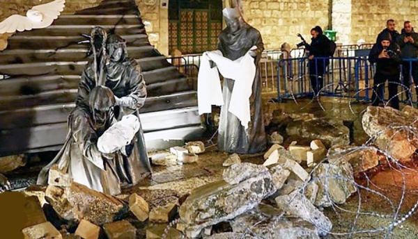 Bethlehem nativity scene depicted with rubble and razor wire.
