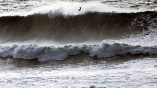 A surfer catches some air off a wave at Mavericks Beach near Half Moon Bay, California, US, on Thursday. — courtesy Reuters