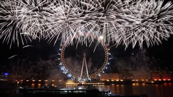 Fireworks light-up the sky over the London Eye in central London to celebrate the New Year on Monday, Jan. 1, 2024