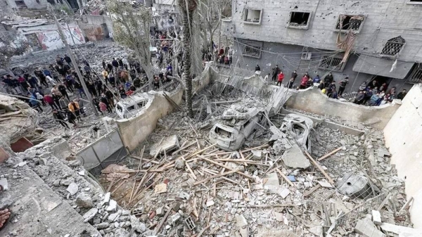 People inspect the site of an Israeli strike on a house in Jabalia, in the northern Gaza Strip, on Wednesday. — courtesy, Reuters