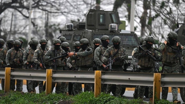 Soldiers take part in a joint security operation between the National Police and the Armed Forces at the Regional 8 prison in Guayaquil, Ecuador, on January 7, 2024