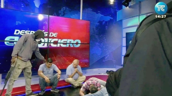 Armed attackers take over a television channel in Ecuador during a live broadcast, Guayaquil Tuesday. — courtesy EPA
