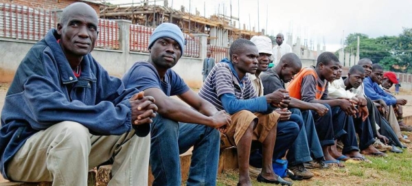 Jobless workers wait for employment opportunities in Lilongwe, the capital of Malawi. — courtesy ILO/Marcel Crozet