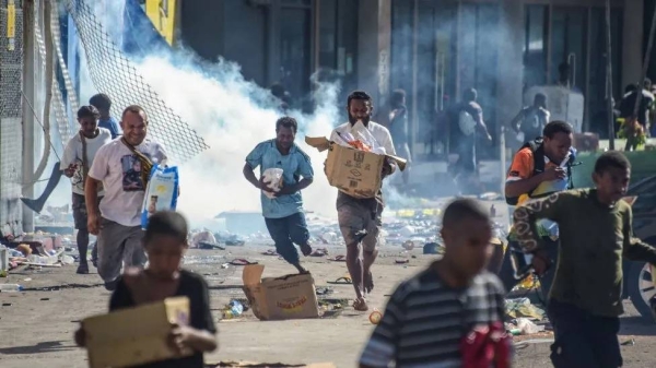 Shops and cars were set on fire and supermarkets looted across the city