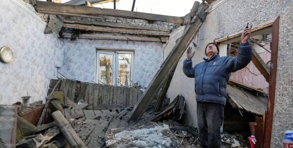 A damaged apartment after recent shelling in Makiivka outside Donetsk, Russian-controlled Ukraine. — courtesy Reuters
