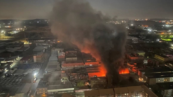 Smoke rises from the deadly fire in Johannesburg, South Africa, that broke out on August 31, 2023