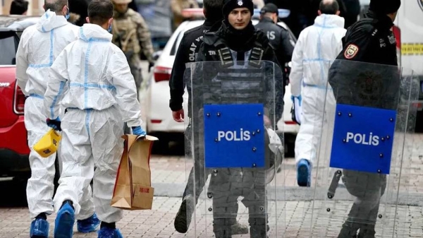 Turkish police and forensic officers in front of Santa Maria church in Istanbul. — courtesy Getty Images