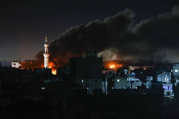 Smoke billows during Israeli bombardment over Rafah in the southern Gaza Strip on February 12, 2024