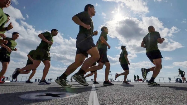 Japanese troops jogging in the day. — courtesy Reuters