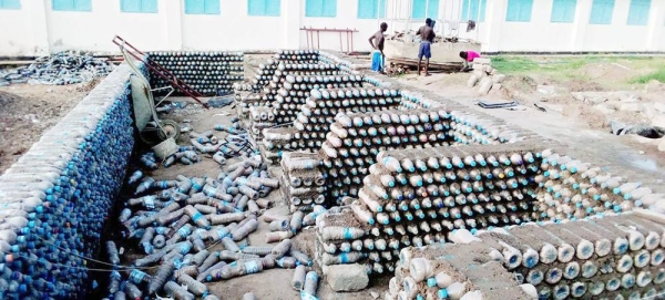 Plastic bottles get a new life, as South Sudanese communities reuse them to make bricks to build a variety of structures. — courtesy Andrew Ugalla